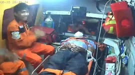 Paramedics sing to calm distressed patient in ambulance