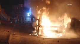 US, Los Angeles: Newhall Pass Firefighters Battle SmartCar Fire