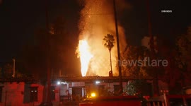 US, Los Angeles: Highland Park Garage Fire With Vehicles Burning