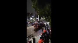 Riot police van rams fallen protester during clashes in Indonesia