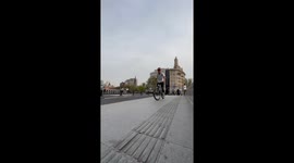 Awkward Moment in Bike Stunt Pose