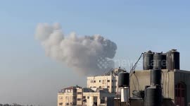 Smoke billows over buildings in Gaza City following Israeli strike