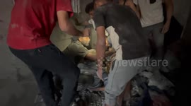 Two dead, survivor pulled from rubble after Israeli strike in central Gaza