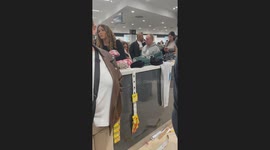 Man with bald head and forehead spikes struts around Primark like a diva