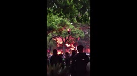 Protesters torch police station after taxi rider is killed by armored truck in Indonesia