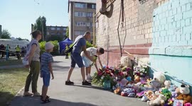 Ukraine's Zelenskyy visits Kyiv attack site, vows response after deadly strike