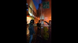 Bus station set alight in Indonesia protests as three government staff are killed