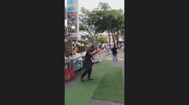 Coconut Drink Seller Wows Crowd With Amazing Coconut Toss at Jonker Walk in Melaka Malaysia