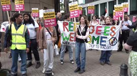 Protesters gather in front of asylum hotel in London