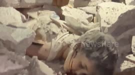 Severely injured Palestinian child pulled out from rubble after Israeli strike in Gaza