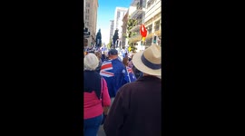 Thousands march peacefully in anti-immigration rally in Brisbane, Australia