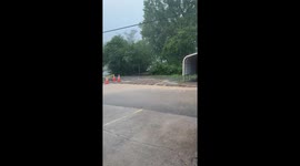 Heavy summer rain drenches streets in Mena, Arkansas