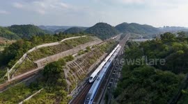 China: Record 940 mln railway trips made during China's summer travel rush