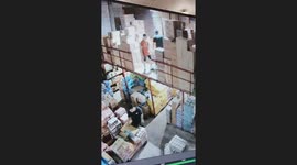 Man passing box takes an unexpected dive after stepping too far near the edge