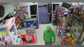 Armed robber botches heist when bakery owner beats him with a broom