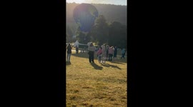 Hot air balloon gets caught on pole before crash-landing into cars at Chatsworth Country Fair