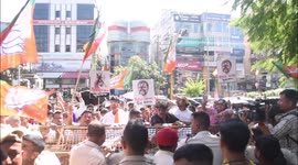 BJP supporters participate in a protest march over the alleged use of abusive language against Prime Minister Narendra Modi