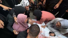 Palestinians mourn loved ones killed by Israeli strikes on Gaza