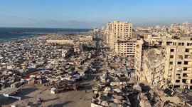 Thousands of Palestinians trapped along Gaza coast as experts call Israel's actions genocide
