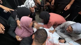 Palestinians mourn loved ones killed in Israeli strikes on Gaza