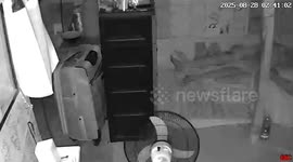 Electric fan engulfed by flames as residents sleep