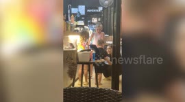 Little boy runs face-first into a glass door