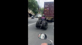 Motorcycle rider seen carrying four huge tyres on the back