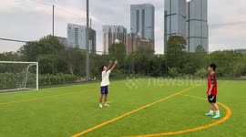 Young footballer fails while trying overhead kick