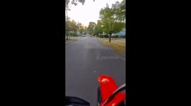 Motorcycle runs stop sign and collides with car in Syracuse, New York, USA