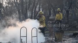 Fire extinguishing efforts continue as wildfire destroys buildings in Chinese Camp, California