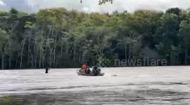 Rescue teams deploy boats and trucks to aid flood victims in northeastern  Thailand