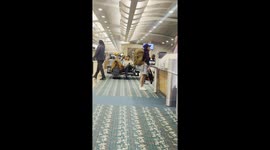Woman Kicks Airline Agent During Epic Crash Out