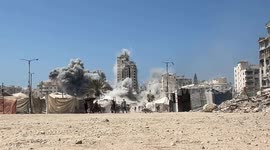 MOMENT - Israeli airstrikes hit residential tower in Gaza City