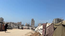 MOMENT - Israeli airstrikes hit residential tower in Gaza City (2)