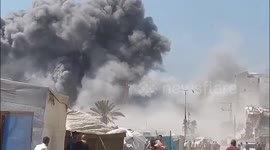 Moment Gaza high-rise building collapses after being hit by an Israeli air strike 1/2