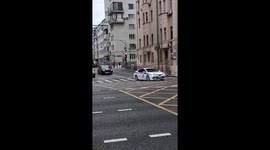 Yandex courier robot blocks motorcade with flashing lights in Moscow, Russia