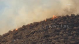 US, Los Angeles: Jurupa Valley Brush Fire Near Pyrite Street Forces Evacuations