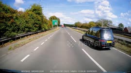 UK motorist shocked as hearse carrying coffin speeds past them on road