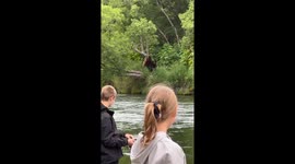 Bear with cub spotted by fishermen in Kamchatka, Russia
