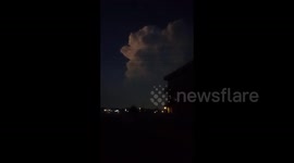 Pakistan: White Clouds Drift Over Thunderstorm Skies in Islamabad