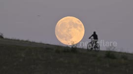 Harvest moon rises over San Mateo, California
