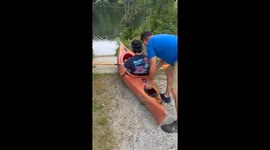 Entering the River via Pushing a Kayak Down the Stairs