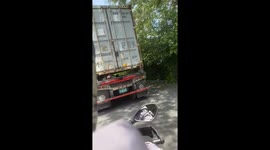 Man Naps Under Huge Truck Like It’s a Hammock