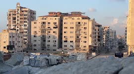 MOMENT - Israeli army bombs another high-rise building in Gaza City