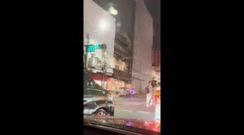 Selfish tourists block traffic to stand on stool while making social media clips