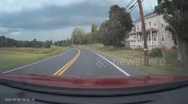 Driving toward dark storm clouds in Germansville, Pennsylvania