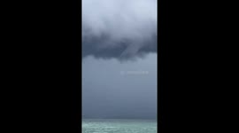 Waterspout rips through beach as locals watch in Florida