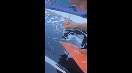Graffiti artist draws on Rolls-Royce Ghost at art fair