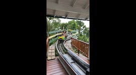 Girl startled by a sudden collision after completing her ride at Mystic Mountain