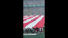 Man gets stuck on giant flag at MetLife Stadium in New Jersey, USA